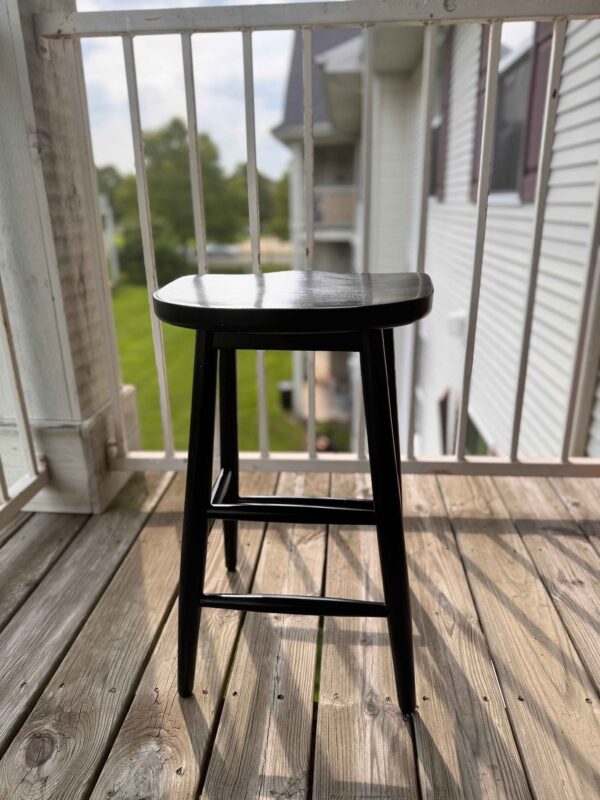 black wooden stool